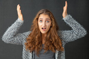 Teenage Girl with braces with beautiful long curly hair