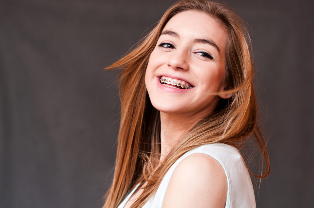 Smiling girl with braces