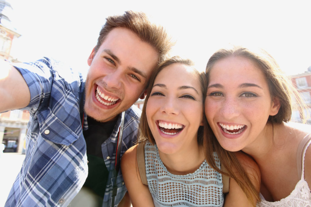 Group of teen friends smiling