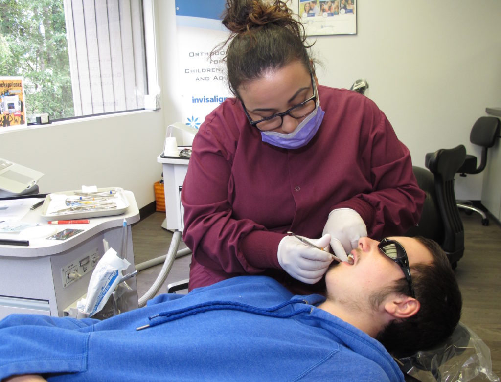 Dudley Smiles staff working with a patient