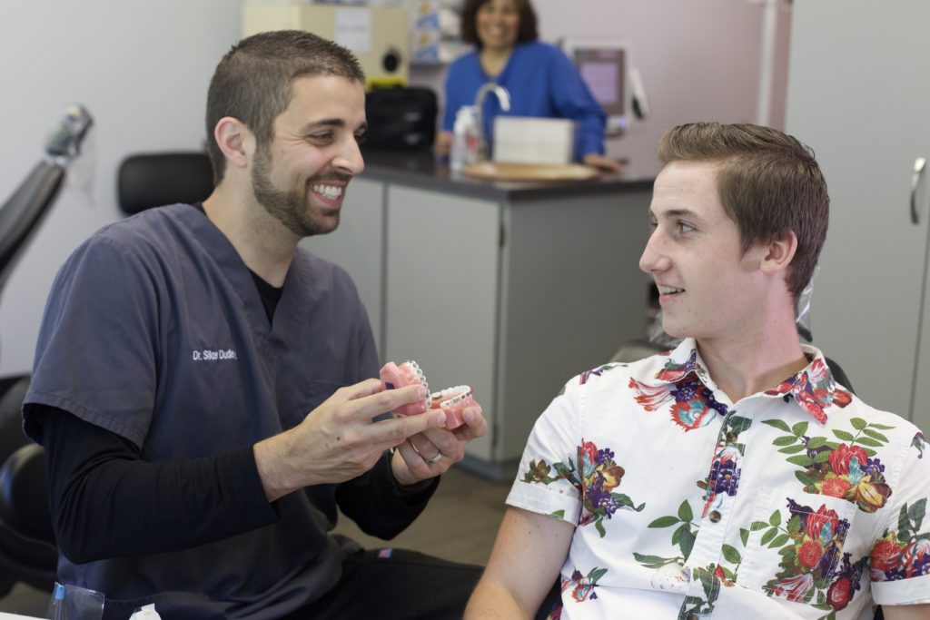 Dr. Dudley talking to a patient