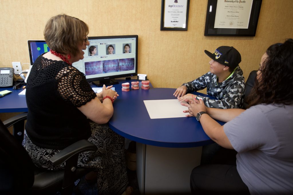 Dudley staff talking to a patient