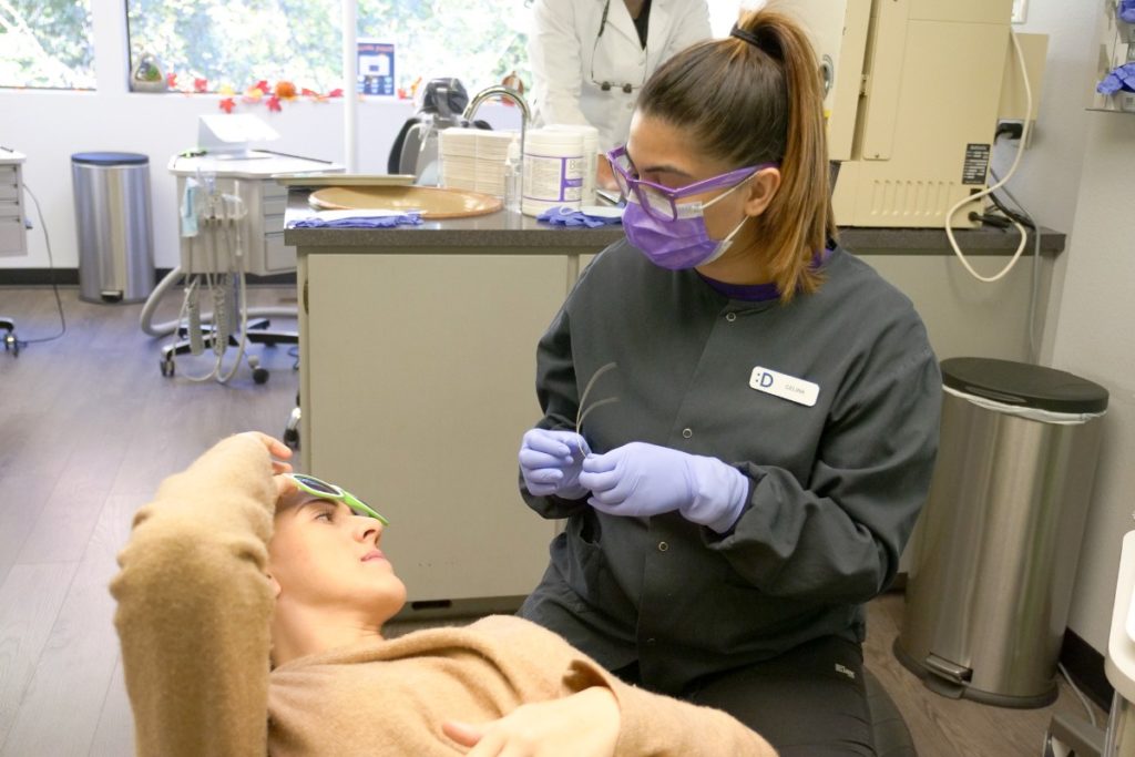 Dudley assistant with patient