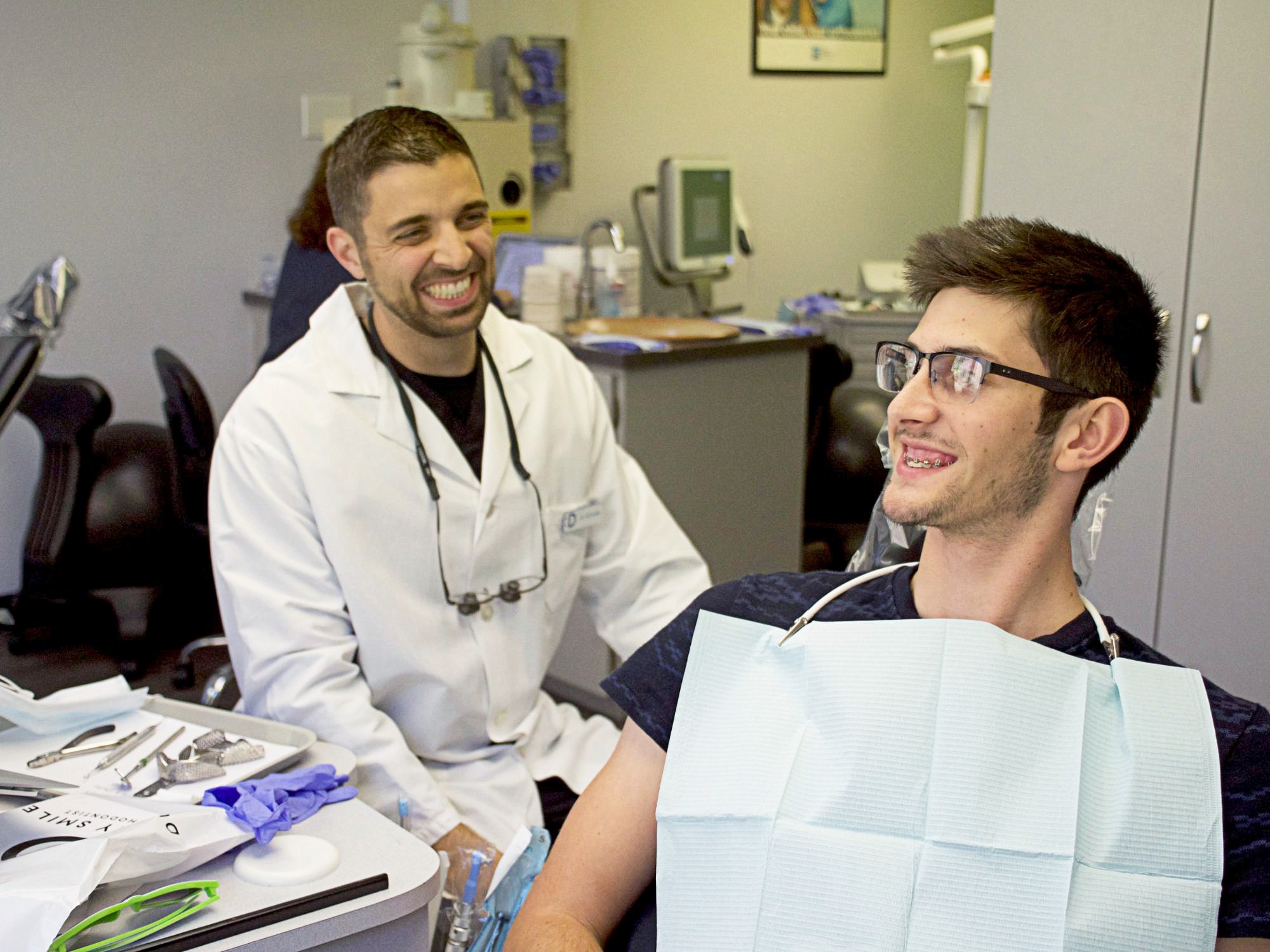 dr. dudley and teen laughing