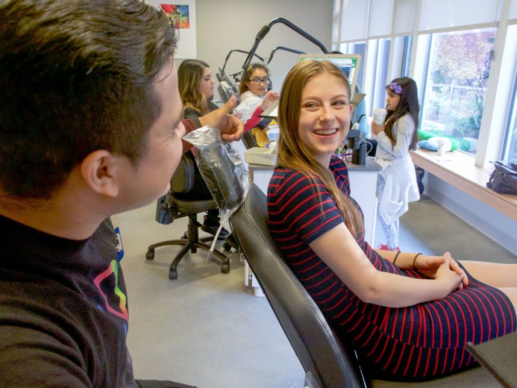 Dudley assistant with a patient