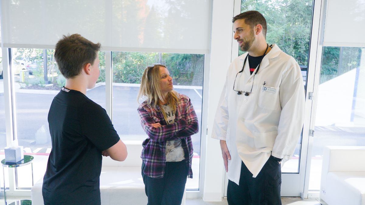 Dr. silas talking to a patient's mom